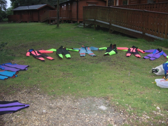 A circle of wet suits