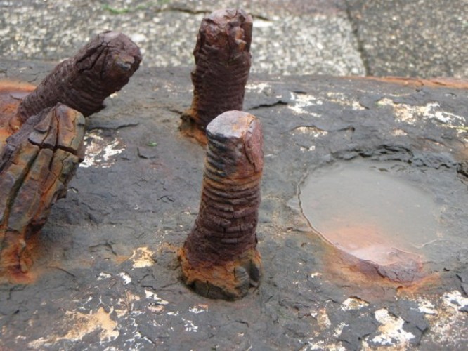 Four bolts on the Mullberry